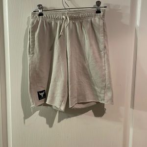 Boys Youth Size large Under Armour cream colored gym shorts